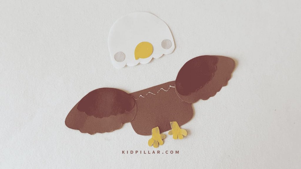 Glue the wings of bald eagle craft for preschoolers