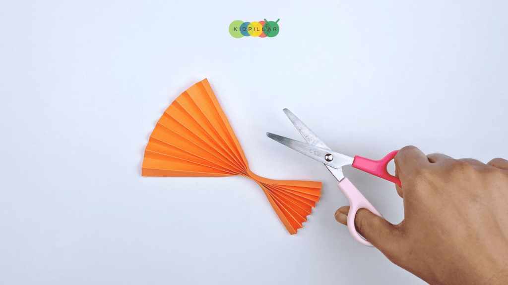 Glue accordion folds to make cute heart fox craft for kids