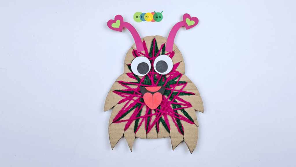 Glue the antennae on cute yarn wrapped love monster craft