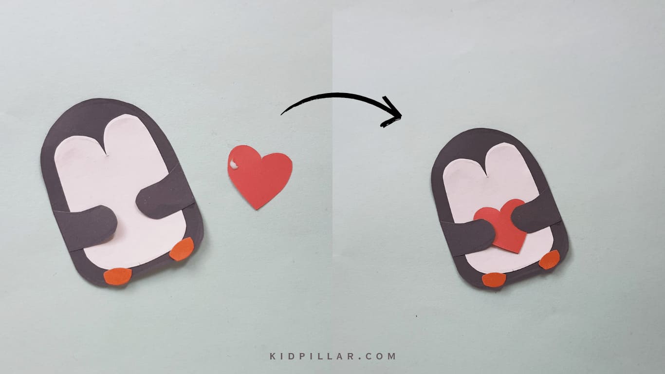 Glue the heart on the body of easy paper penguin bookmark.