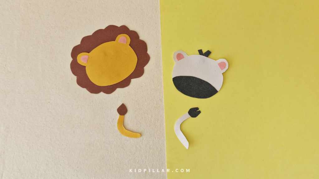 Glue tail cutouts for lion and zebra animal craft for kids