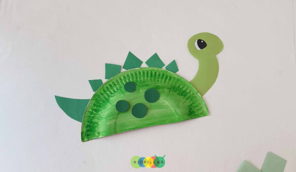 Glue tail and face on Fun dinosaur craft easy