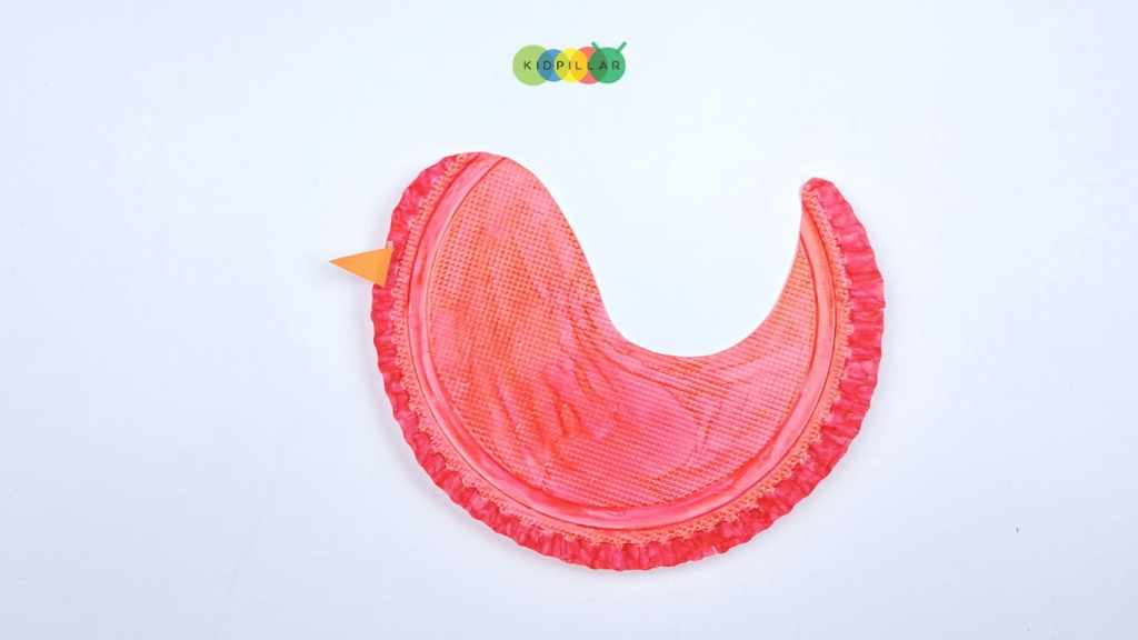 Paste an orange beak on  paper plate love birds