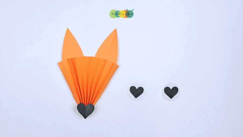 Glue nose on heart fox paper craft for kindergarten