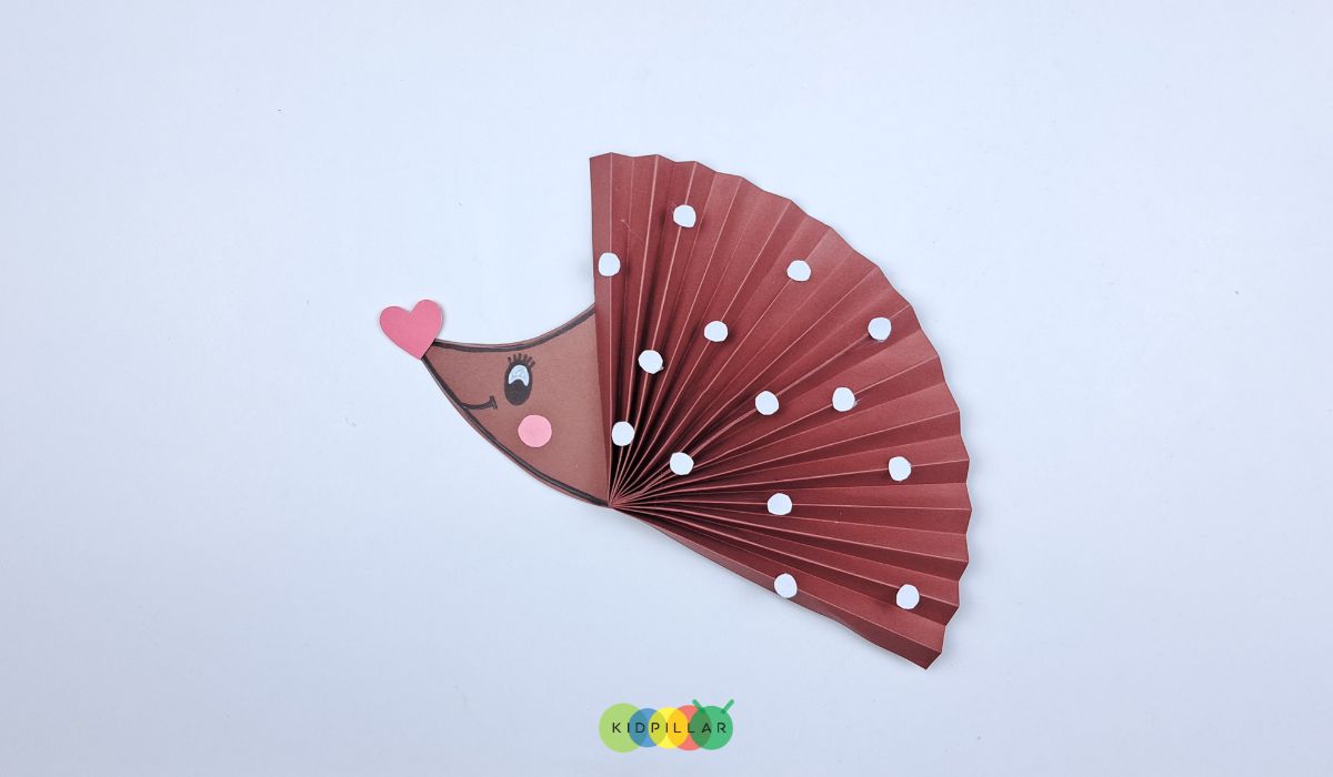 Add spots to paper hedgehog craft