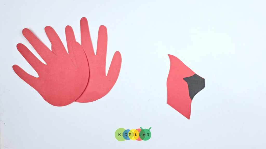 Paste the face patch of Paper plate cardinal craft with paper