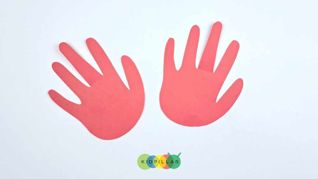 Trace the handprint and cut them to make paper plate cardinal handprint craft