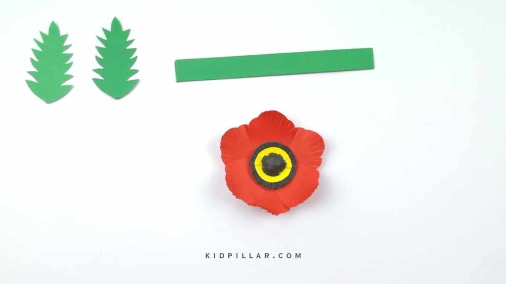 Glue yellow circle on black circle and paste small black circle on yellow circle to complete the paper poppy flowers