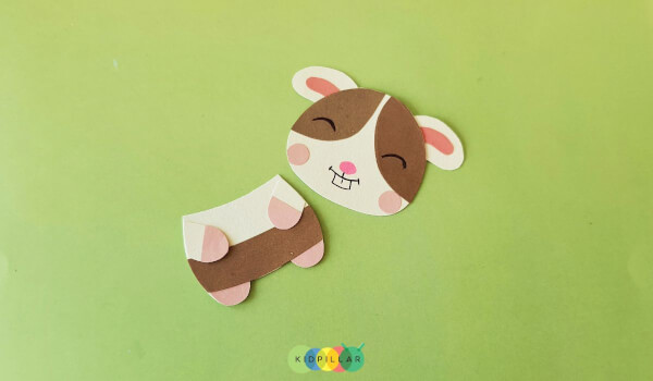 Paste face on the body of simple guinea pig craft