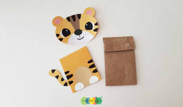 Paste craft paper on paper bag to Simple tiger craft with paper