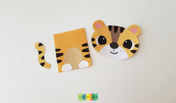 Add stripes to body and face of simple tiger craft