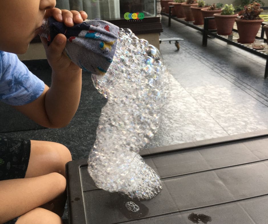 making homemade bubbles is the best thing to do with toddlers at home