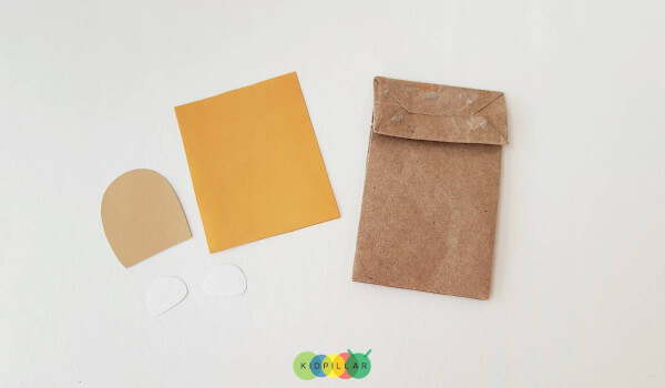 Brown paper bag for tiger hand puppet craft