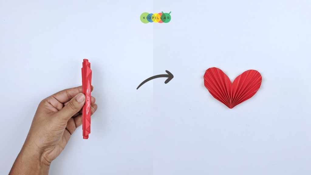 Glue the folds to make heart for valentine Heart ladybug