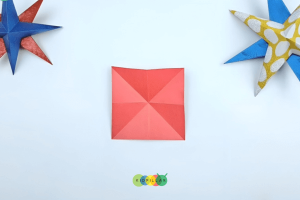 Make creases on paper for star crafts for kids